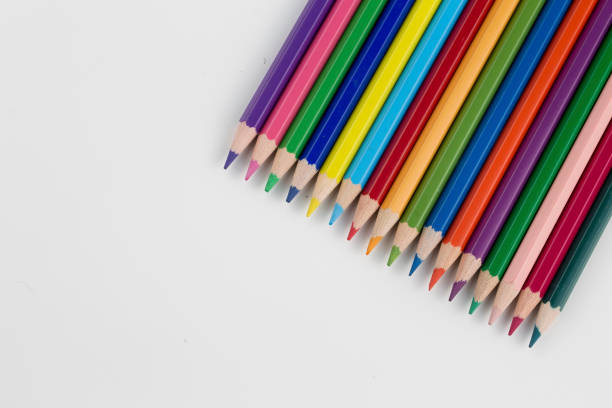 istock Color pencils isolated on the background. Close up. 1051623448