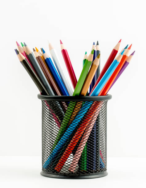 istock Color pencils isolated on the background. Close up. 1051623514
