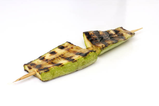 istock zucchini grilled on a grill on a spit 1051632914