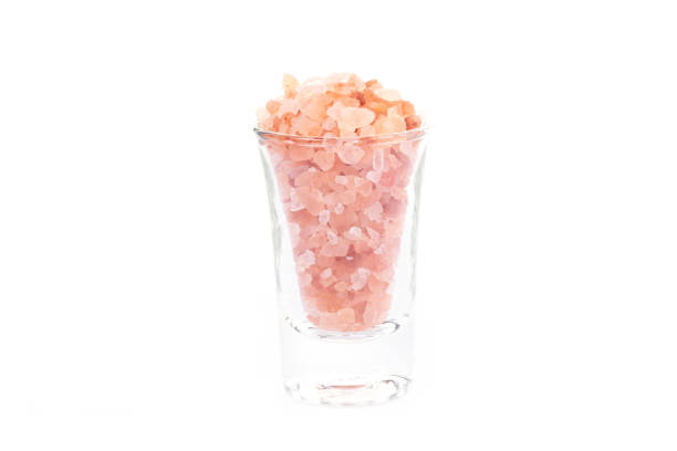 Himalayan Pink Salt isolated on white background. Health concept.