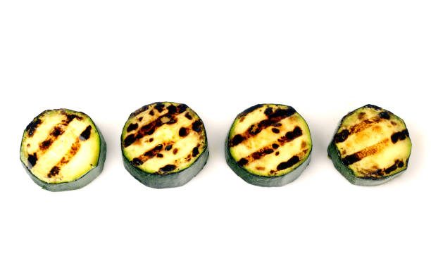 istock green zucchini grilled on white background for isolation 1051641464