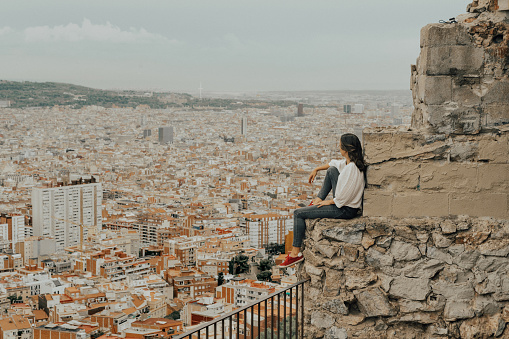 Woman looking at view over Barcelona