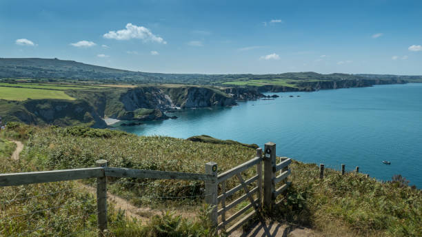 Caves at Raming Hole, looking towards Stackpole Head, Pembrokeshire, Wales, UK