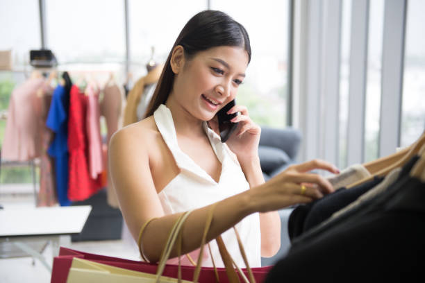 istock girl shopping cloth 1051652486