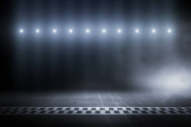istock Race track finish line racing on night 1051656050