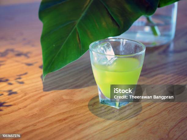 A Refreshing Glass Of Iced Sweet And Sour Lemongrass And Mint Punch Stock Photo - Download Image Now