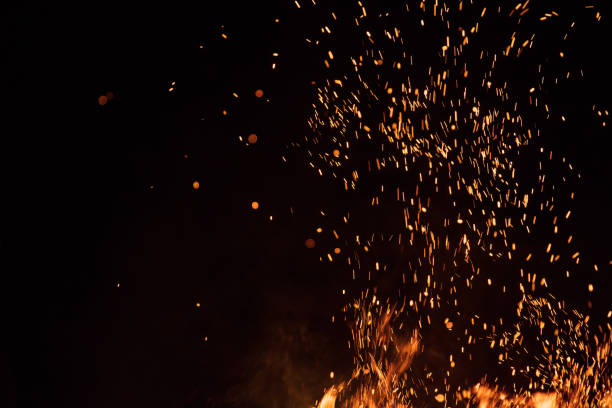 istock Burning sparks flying. Beautiful flames background. 1051666972