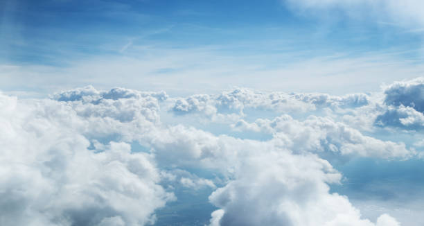 istock Blue sky and clouds background with lots of copy space. 1051667318