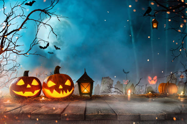 istock Halloween pumpkins on old wooden planks. 1051669838