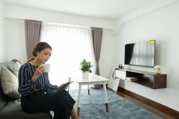 istock Serious Asian girl reading book on tablet 1051669964