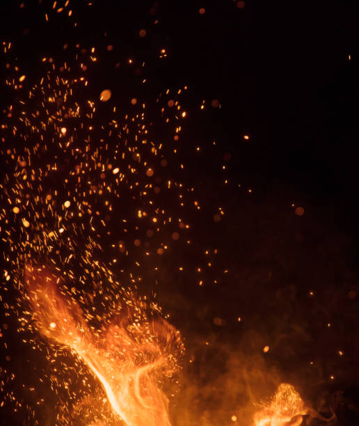 istock Burning sparks flying. Beautiful flames background. 1051670018