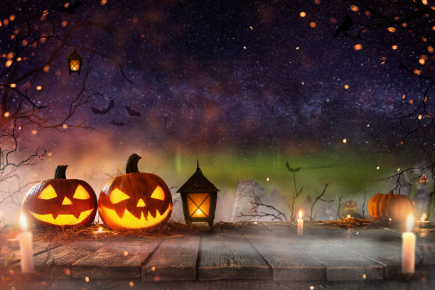 istock Halloween pumpkins on old wooden planks. 1051670040