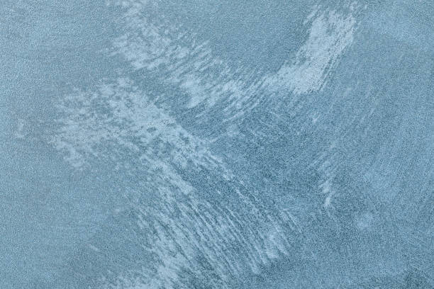 istock Texture of blue decorative plaster or concrete. 1051670386