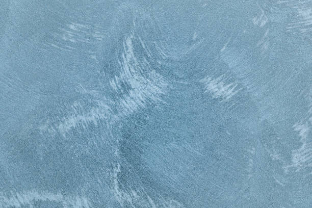 istock Texture of blue decorative plaster or concrete. 1051670398
