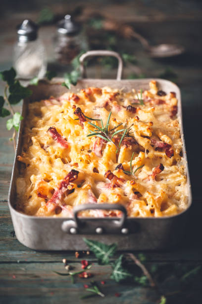 istock Mac and Cheese, Gratin de Macaroni with Speck Ham and Rosemary 1051670472