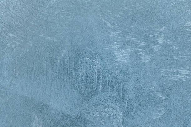 istock Texture of blue decorative plaster or concrete. 1051670874