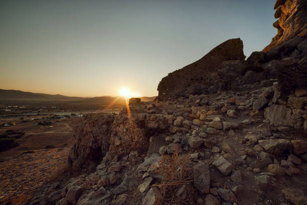 istock Beautiful sunset seen from Feraklos Castle in Haraki, Greece 1051671226