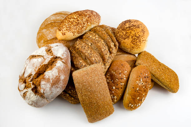istock Different kinds of bread and bread rolls. Kitchen or bakery poster design 1051685732