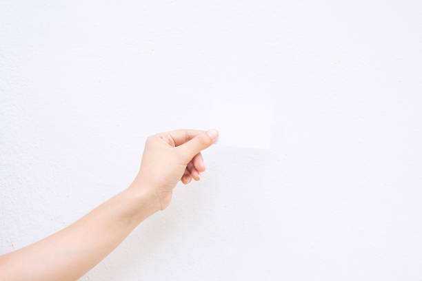 istock female hand on the white background 1051686552