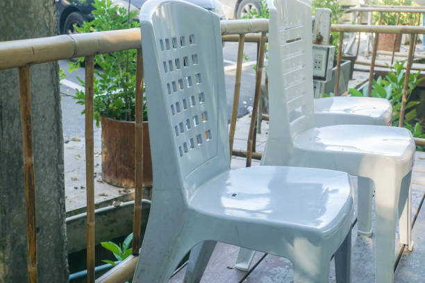 istock white plastic chairs for seat outdoor 1051687626