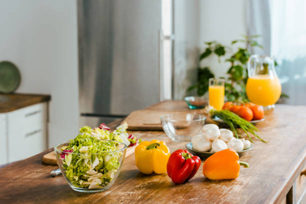 istock close-up shot of various raw vegetables on table at modern kitchen 1051690810