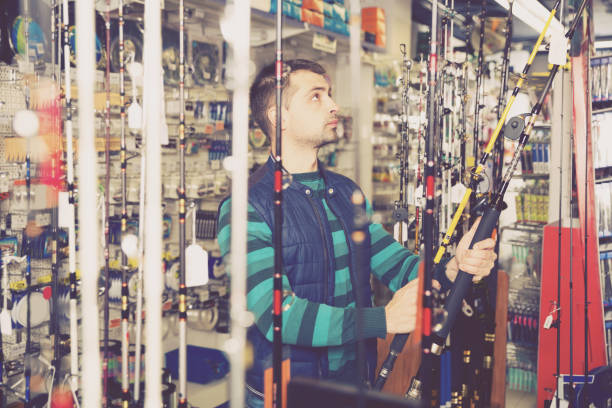 istock man selecting fishing rod 1051694518