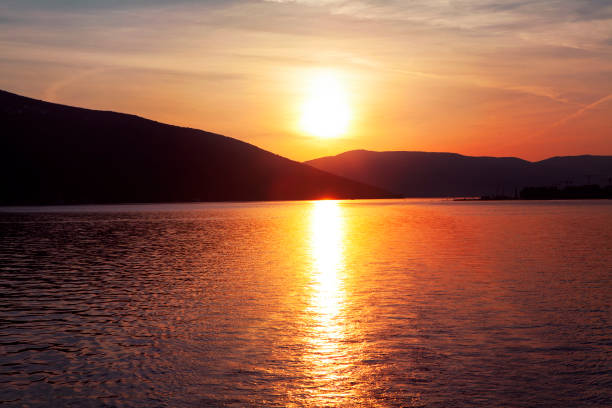 istock beautiful sunset over the bay 1051695396