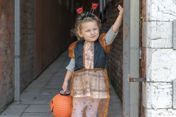 istock Little girl dressed up for Halloween 1051695440