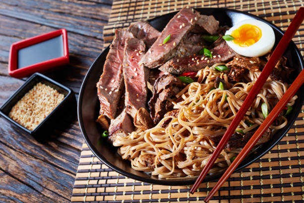 istock a bowl of soba with sliced roast beef 1051698318