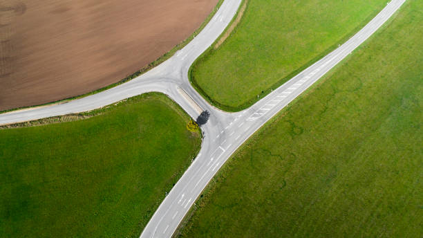 istock Road junction, intersection - agricultural area, aerial view 1051698744