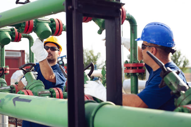 istock Oil engineers inside fuel industry 1051706678