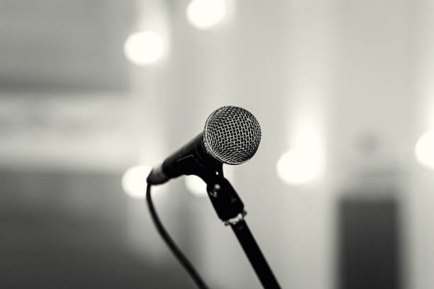 istock A microphone on stage in a concert hall or american bar (restaurant) during a show. 1051706702