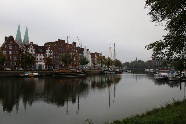 istock small river with a skyline in the city at a rainy day 1051709504