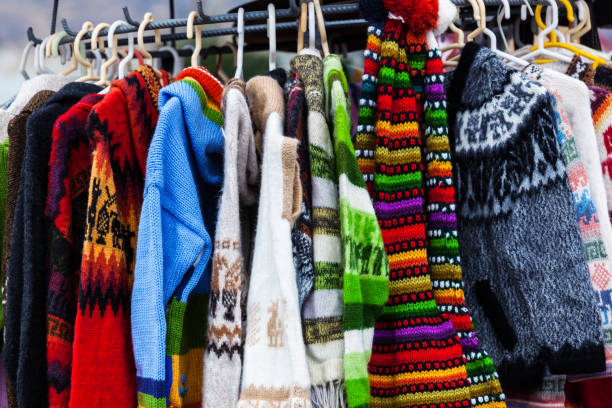 istock sweaters from alpaca wool on market in Peru 1051712212