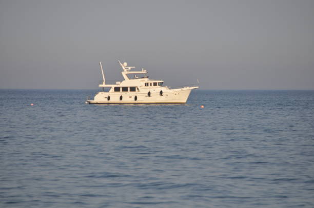 istock The beautiful Luxury yacht in open sea 1051713364