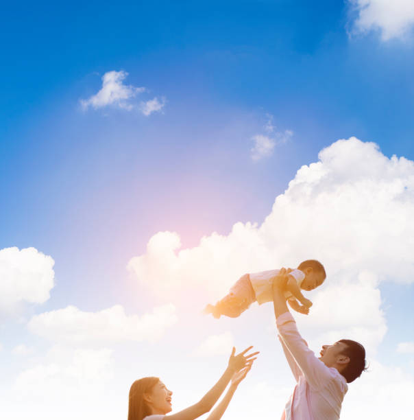 istock happy parents playing with baby boy 1051716830