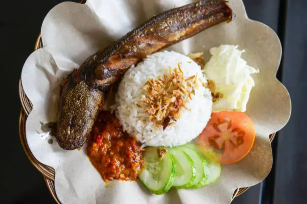 Javanese Indonesian food fish with rice and vegetables