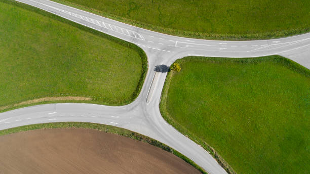 istock Road junction, intersection - agricultural area, aerial view 1051717698