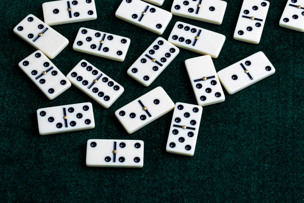 istock Falling dominoes. Domino effect. The domino game. 1051717804