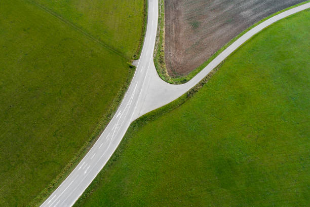 istock Road junction, intersection - agricultural area, aerial view 1051718484