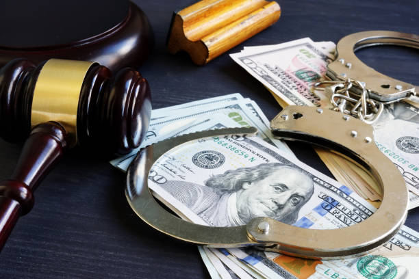 Bail bond. Corruption. Gavel, handcuffs and money. Bail bond. Corruption. Gavel, handcuffs and money. cricket stump photos stock pictures, royalty-free photos & images