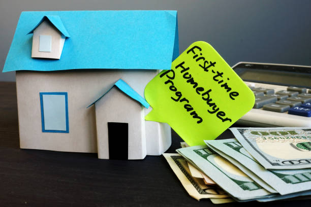 istock First time homebuyer program and model of house. 1051720016