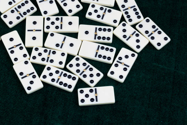 istock Falling dominoes. Domino effect. The domino game. 1051720142