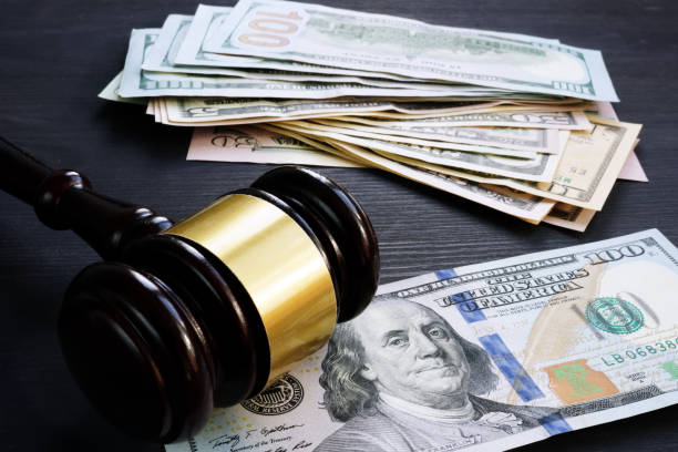 Bail bond and financial penalty. Gavel and money. Bail bond and financial penalty. Gavel and money. bail stock pictures, royalty-free photos & images