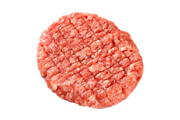 istock Raw hamburger patty. Raw burger for hamburger isolated on white background. Top view. Ingredient for burger. 1051727360