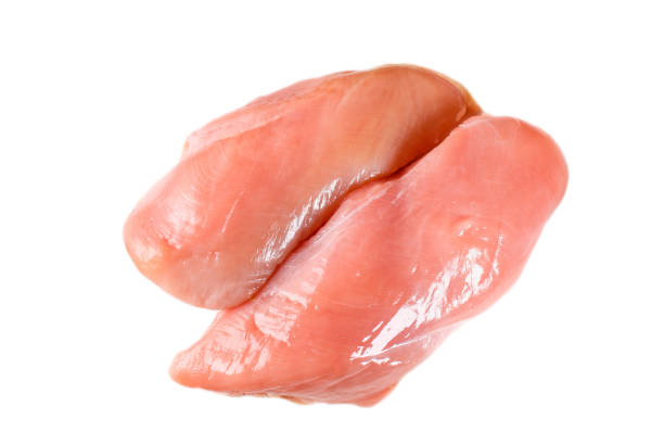 istock Raw chicken fillet isolated on white background. Chicken fillet isolate. Raw chicken meat. 1051727612