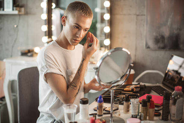 istock Young male makeup artist 1051731746