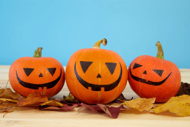 istock Halloween background with pumpkins 1051736060