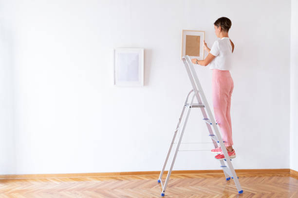 istock Fitting the picture on the wall 1051746644