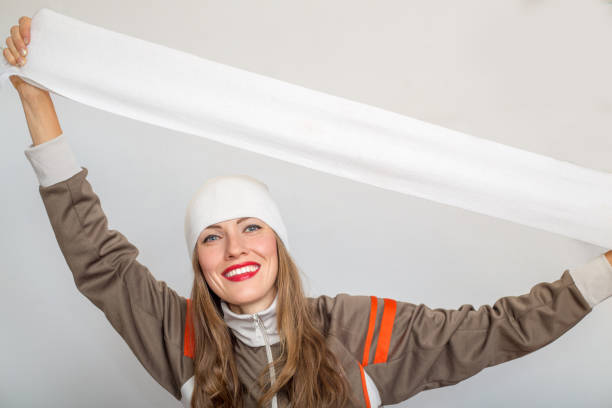 Fanny fan woman portrait Soccer fan watching football drinking juice and wearing sports wear isolated over white background thumbs up for skiing stock pictures, royalty-free photos & images
